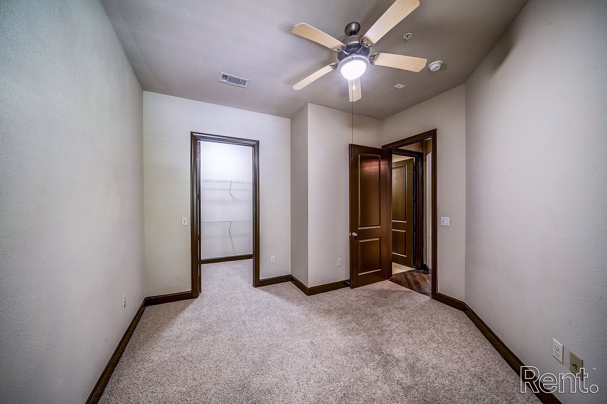 Spacious bedroom with modern decor at The Millennium Waterway luxury apartments