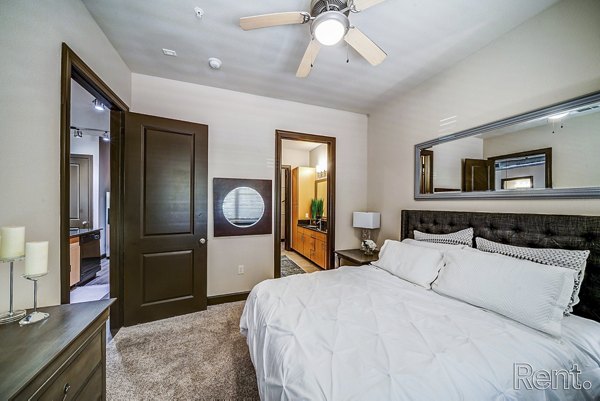 Bedroom featuring elegant decor and king-size bed at The Millennium Waterway luxury apartments