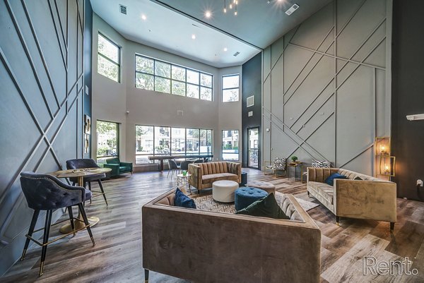 Spacious clubhouse with elegant decor at The Millennium Waterway apartments