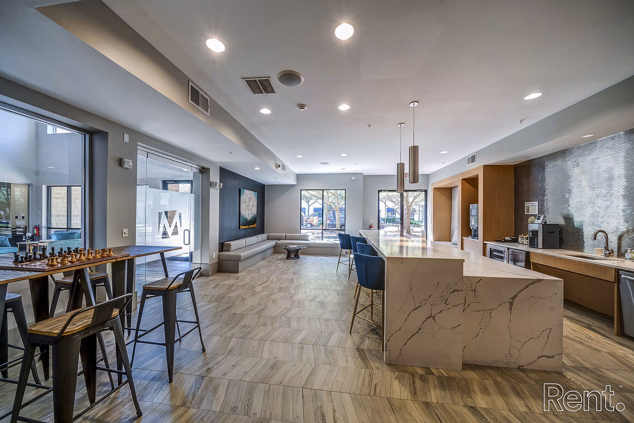 Clubhouse featuring luxury amenities at The Millennium Waterway apartments in The Woodlands, providing a modern social space for residents