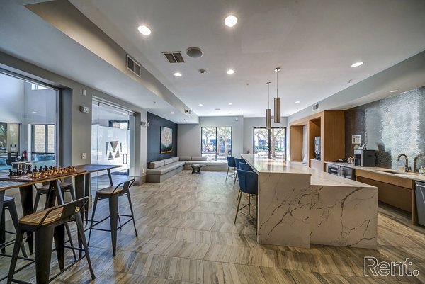Clubhouse featuring luxury amenities at The Millennium Waterway apartments in The Woodlands, providing a modern social space for residents
