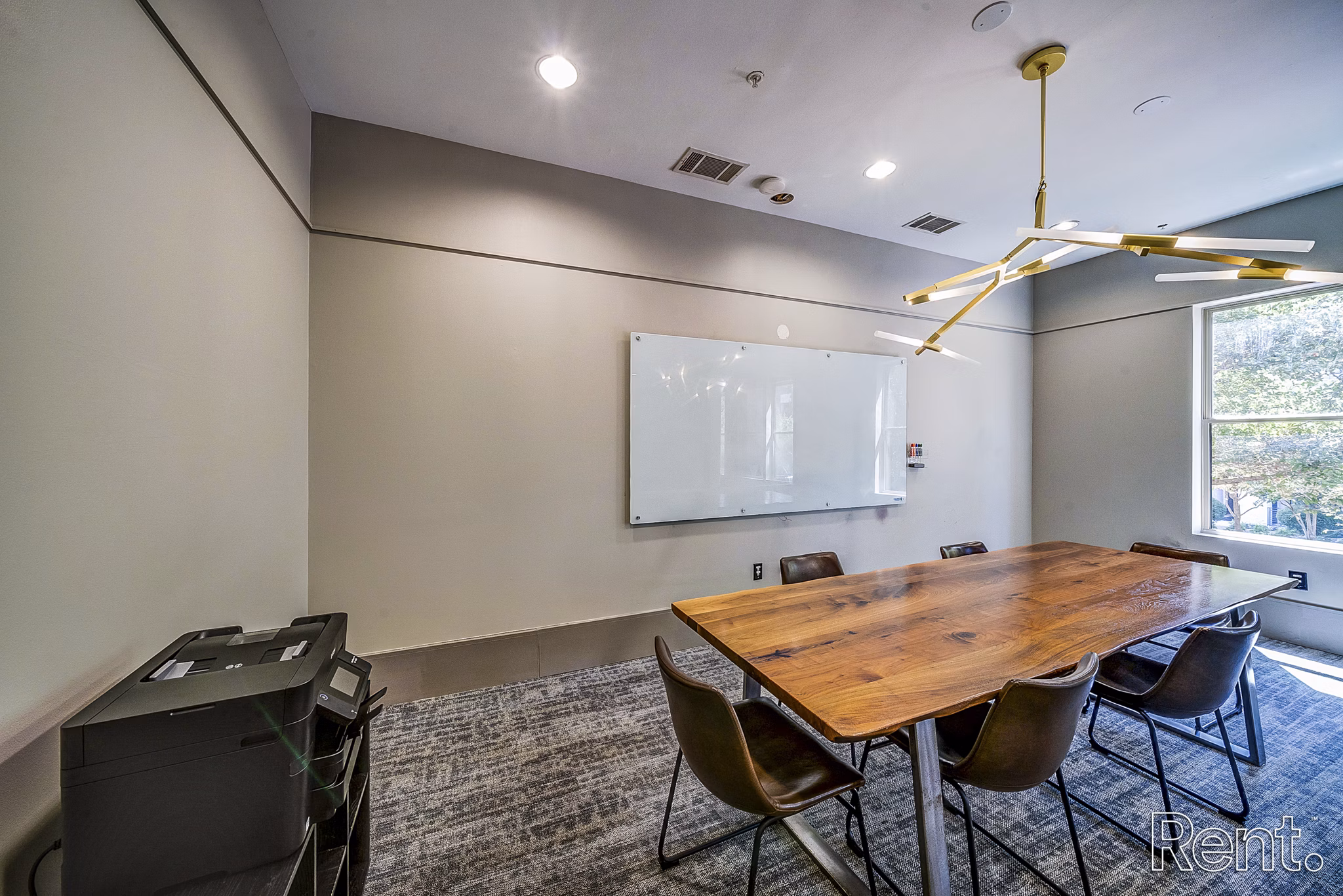 Modern meeting facility with advanced tech equipment at The Millennium Waterway luxury apartments