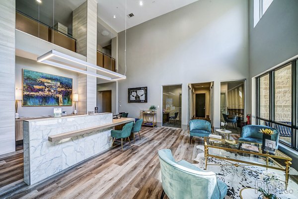 The Millennium Waterway: Elegant clubhouse with wood interiors and modern decor in luxury apartment community