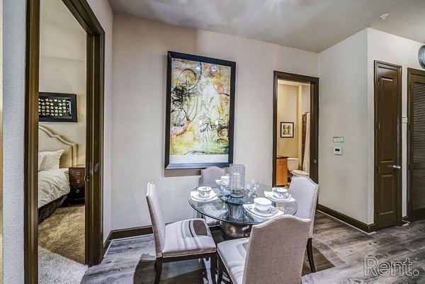 Modern dining area with sleek furniture at The Millennium Waterway luxury apartments