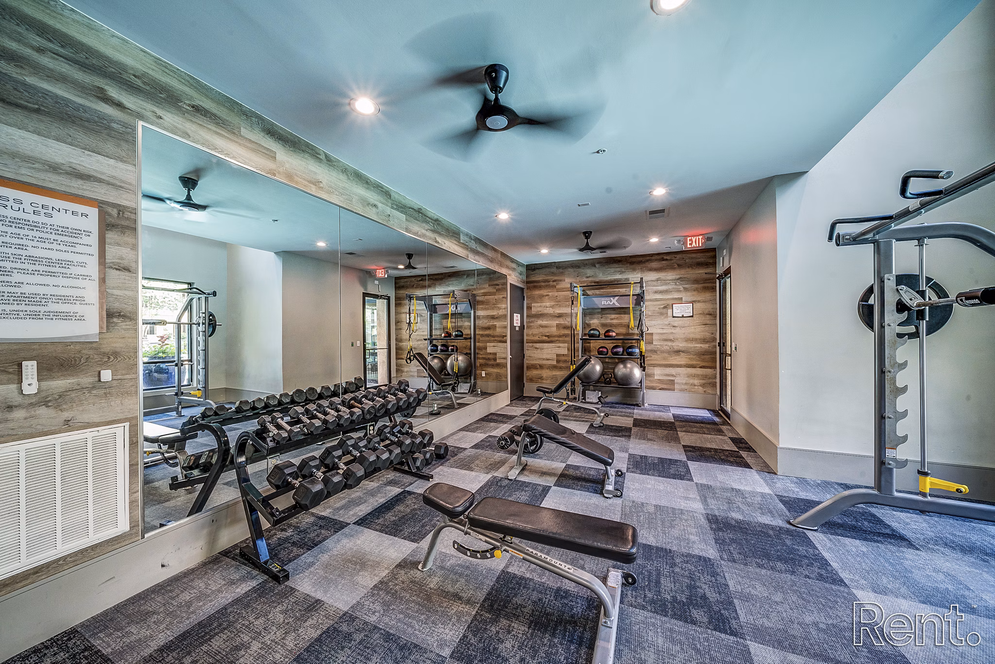 modern fitness center with state-of-the-art equipment at The Millennium Waterway luxury apartments