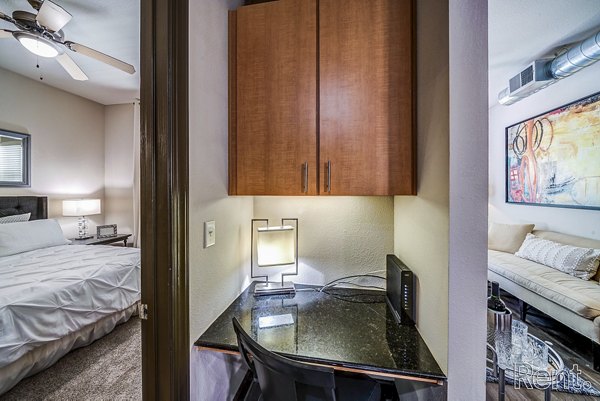 Elegant hallway with modern lighting and artwork in The Millennium Waterway luxury apartments