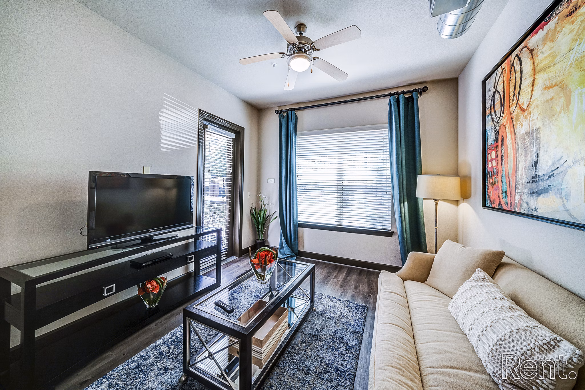 Elegant living room with modern furnishings and natural light in The Millennium Waterway apartments