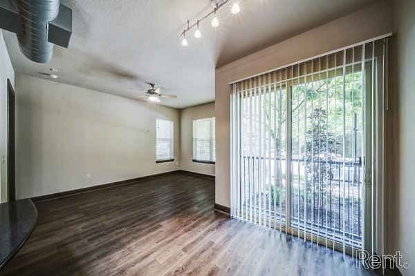 Spacious living room with modern decor in The Millennium Waterway luxury apartments