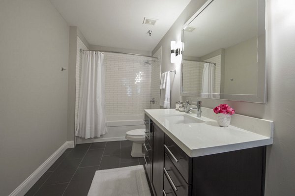 Luxurious bathroom with elegant fixtures at The Rice Apartments