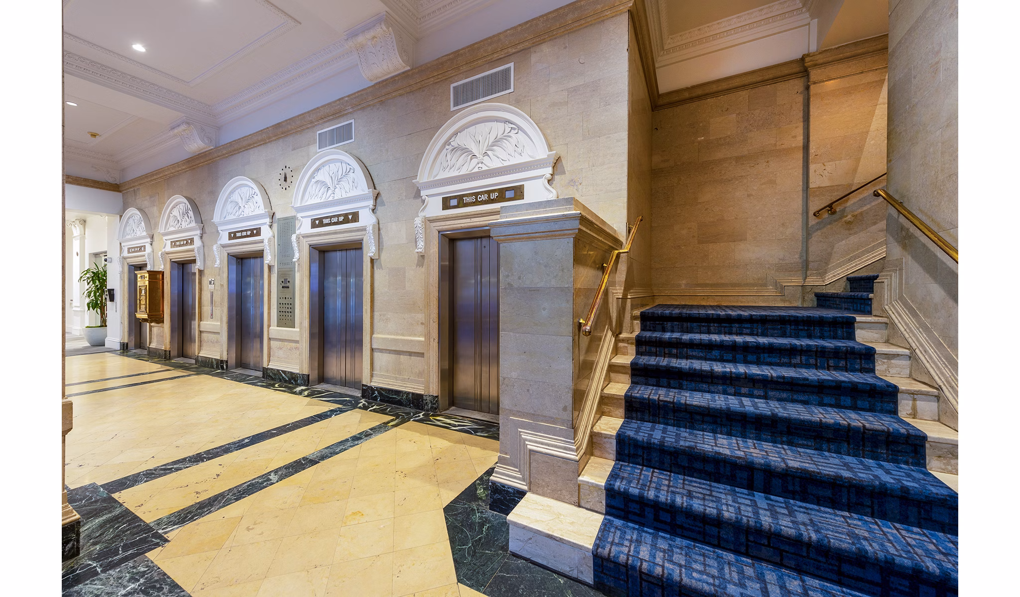 Elegant clubhouse with modern design at The Rice Apartments, perfect for social gatherings and leisure activities