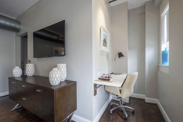 Spacious living room with modern furnishings at The Rice Apartments, a Greystar luxury apartment community