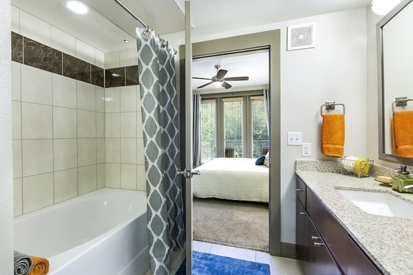 Modern bathroom with sleek fixtures at Pressler Apartments in Austin