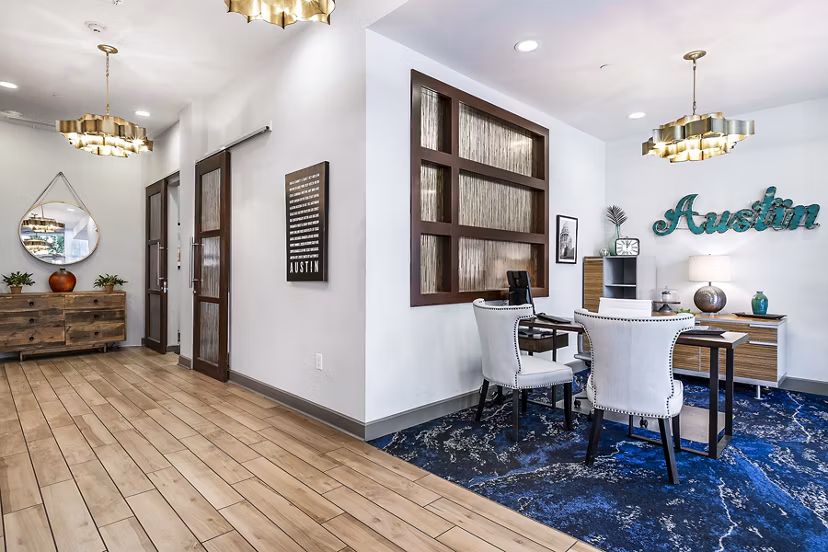 Clubhouse and leasing office at Pressler Apartments featuring contemporary design elements