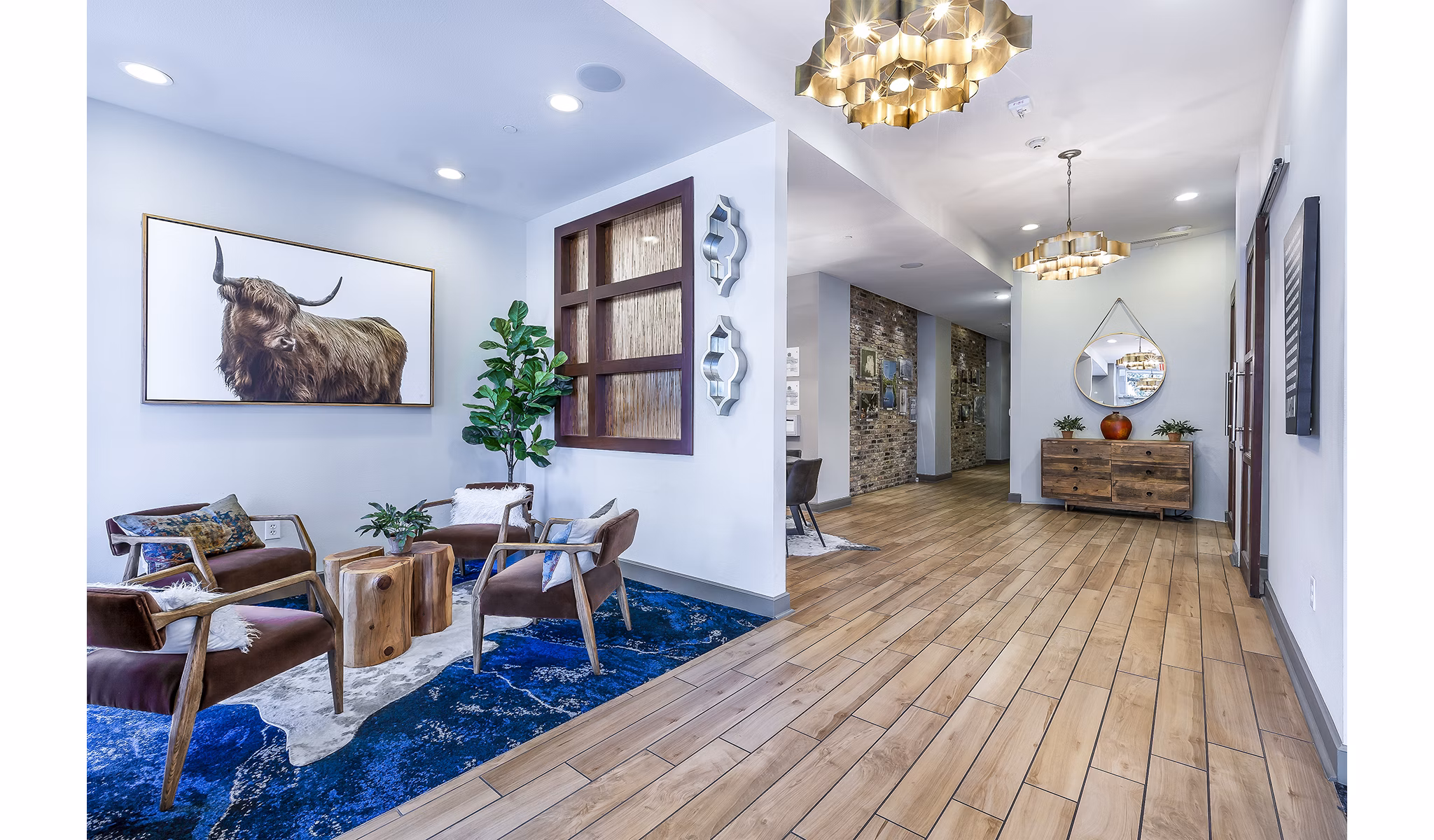 Clubhouse lobby with stylish furniture and modern design at Pressler Apartments, luxurious community in a vibrant urban setting