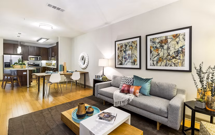 Spacious living room with modern decor and natural light at Pressler Apartments luxury apartments in Austin