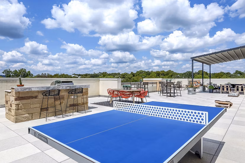 Grill and sport court area at Pressler Apartments offering luxury outdoor amenities for residents