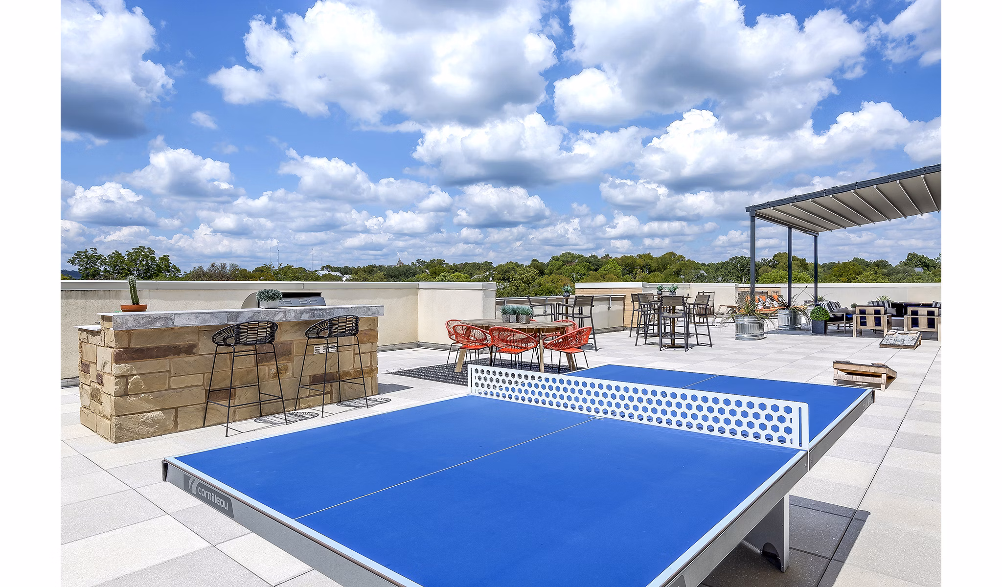 Grill and sport court area at Pressler Apartments offering luxury outdoor amenities for residents