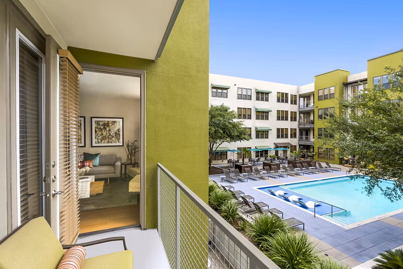 Cozy balcony with modern furniture at Pressler Apartments, perfect for outdoor relaxation