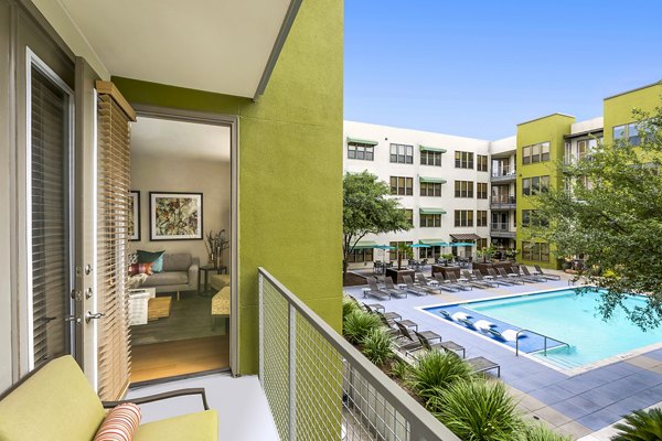 Cozy balcony with modern furniture at Pressler Apartments, perfect for outdoor relaxation