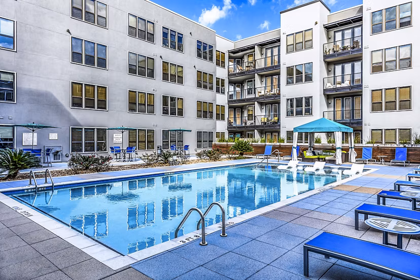 Relaxing rooftop pool offering skyline views at Pressler Apartments in Austin, a prime Greystar luxury property