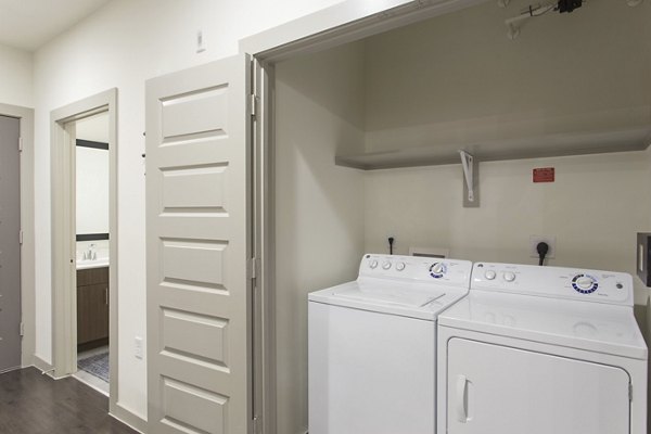 laundry room at Lamar Union Apartments