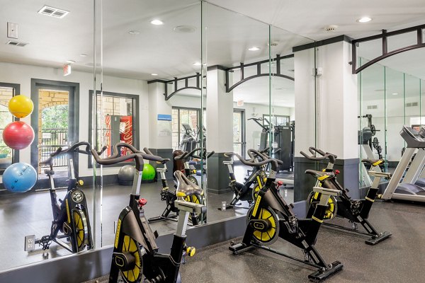 State-of-the-art fitness center at Lantana Hills Apartments with modern equipment and ample workout space