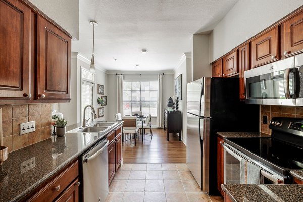 Spacious kitchen with modern appliances in Lantana Hills Apartments