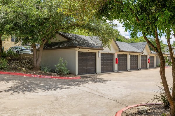 Outdoor recreational area featuring tennis courts and playground equipment at Lantana Hills Apartments, ideal for residents seeking relaxation and activity