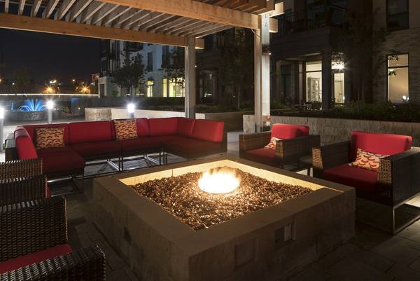 fire pit at Elan Uptown Luxury Apartments