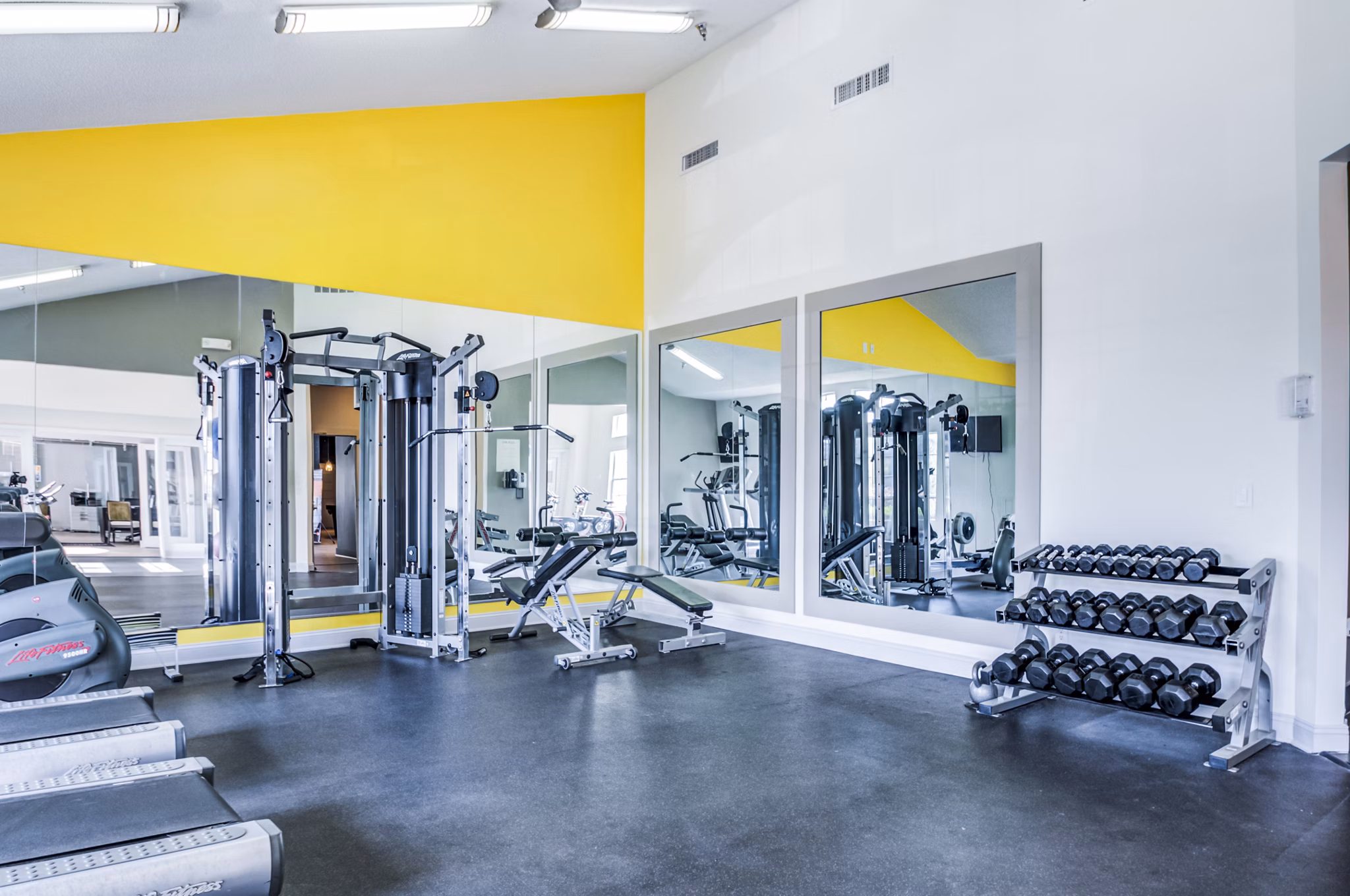 fitness center at Christina Mill Apartments