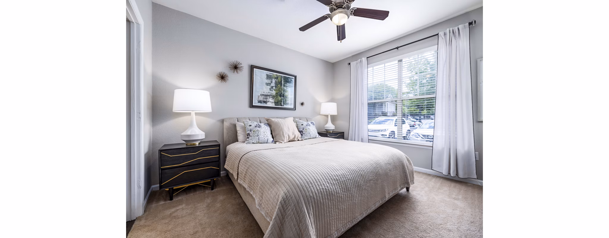 Bedroom featuring elegant decor and natural light at Columns at Wakefield luxury apartments
