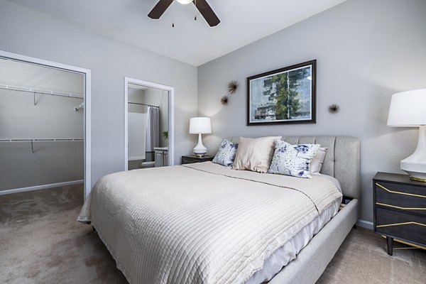 Elegant bedroom with modern furnishings in Columns at Wakefield luxury apartments