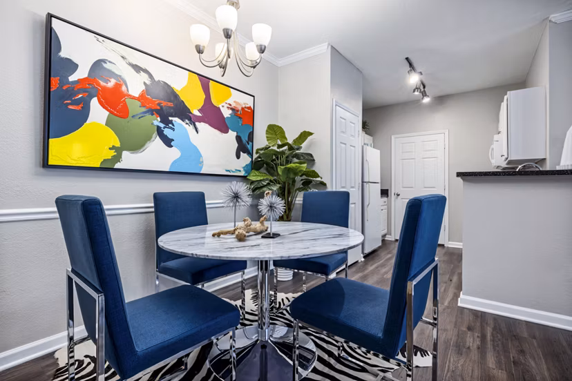 Dining room featuring elegant lighting and modern decor in Columns at Wakefield luxury apartments