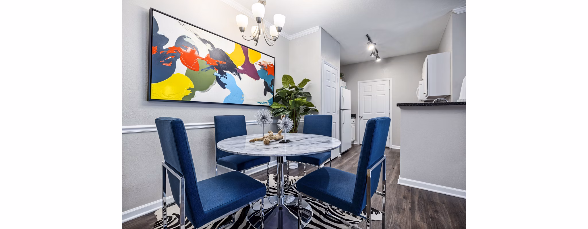 Dining room featuring elegant lighting and modern decor in Columns at Wakefield luxury apartments