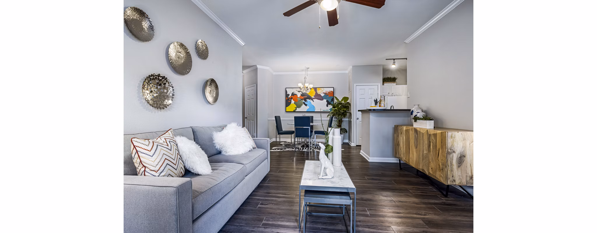 Spacious living room with modern furniture in Columns at Wakefield apartments