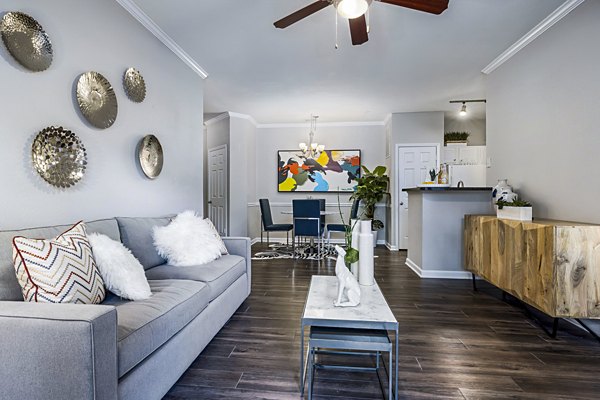 Spacious living room with modern furniture in Columns at Wakefield apartments