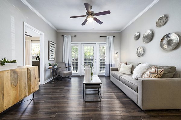 Living room with cozy seating and stylish decor at Columns at Wakefield, luxury apartments for modern living