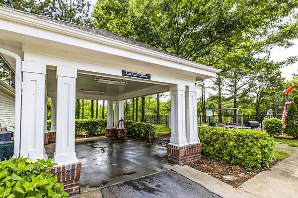 Car wash station with high-pressure hoses at Columns at Wakefield luxury apartments, perfect for vehicle maintenance