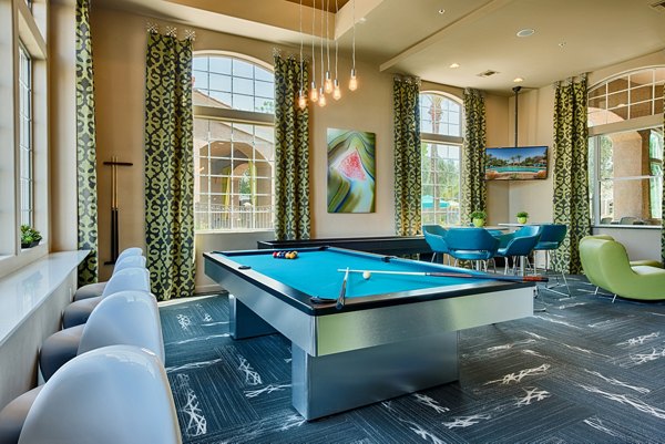Clubhouse with modern design and cozy seating at Pinnacle Terrace Apartments