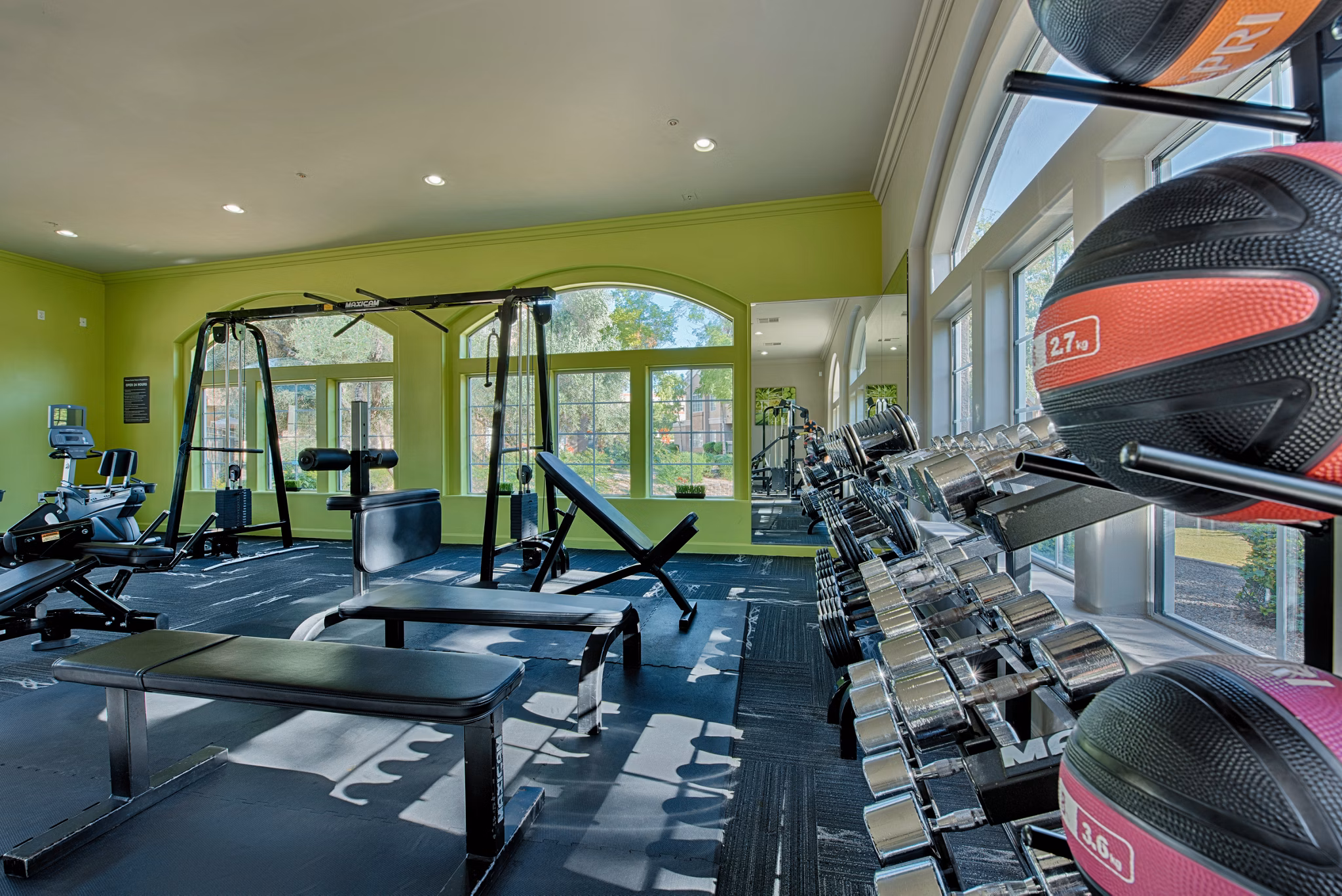 Modern fitness center with state-of-the-art equipment at Pinnacle Terrace Apartments Ideal for active living and wellness enthusiasts