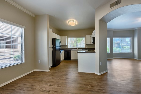 Modern living room with sleek furnishings and natural light at Pinnacle Terrace Apartments