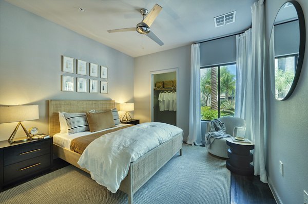 Cozy bedroom with modern decor at Seven Apartments