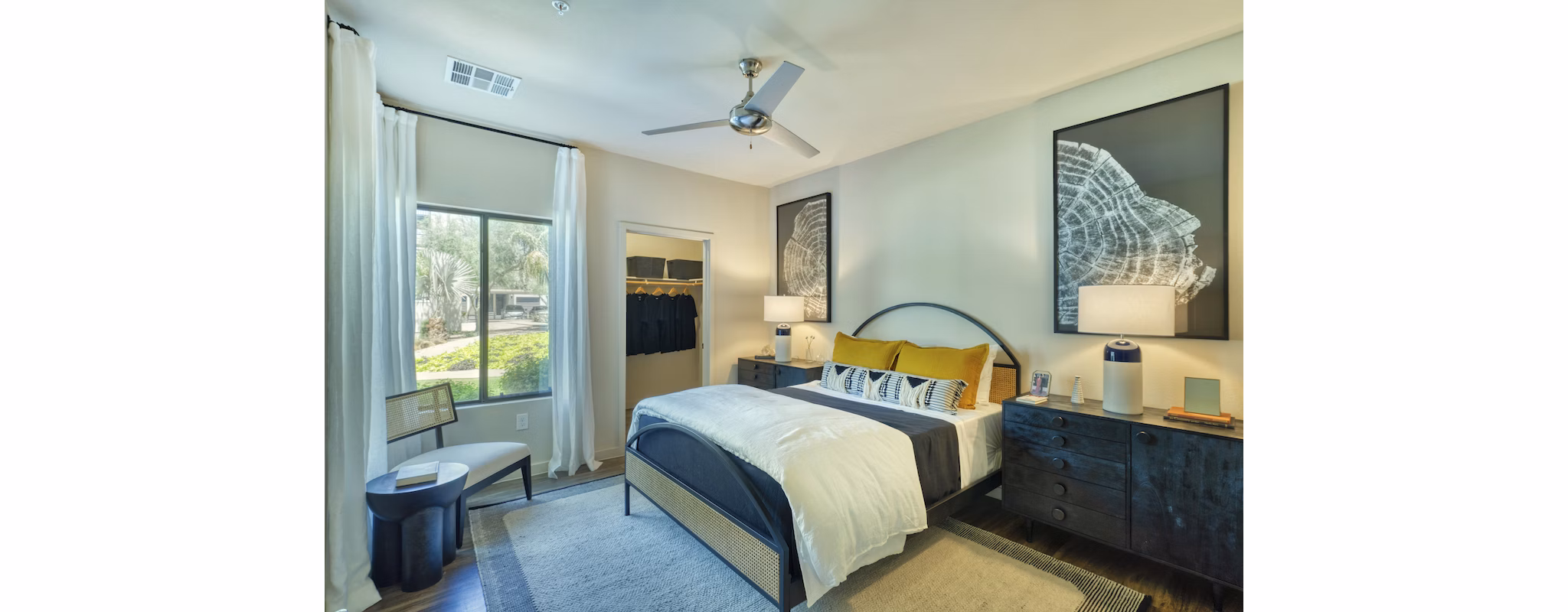 Spacious bedroom with modern design elements at Seven Apartments, offering luxury living by Greystar