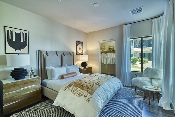 Cozy bedroom featuring modern decor at Seven Apartments luxury living in the city