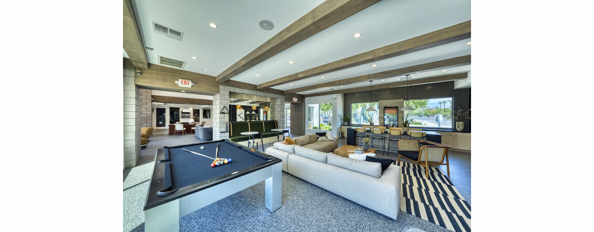 Luxurious clubhouse with modern design at Seven Apartments, offering premium amenities in a Greystar luxury apartment community