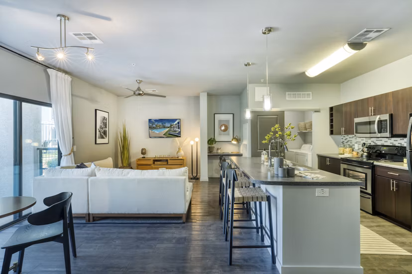 Modern kitchen with stainless steel appliances at Seven Apartments