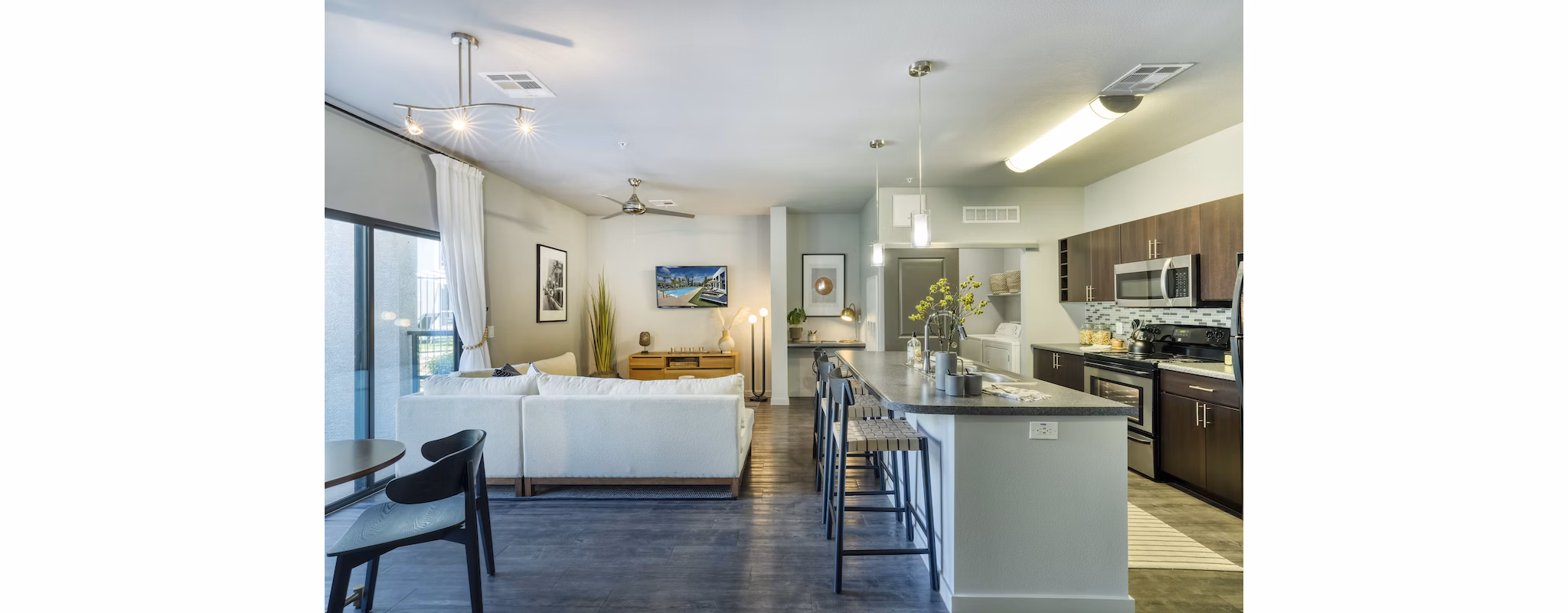 Modern kitchen with stainless steel appliances at Seven Apartments