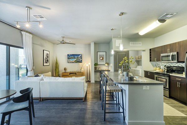 Modern kitchen with stainless steel appliances at Seven Apartments