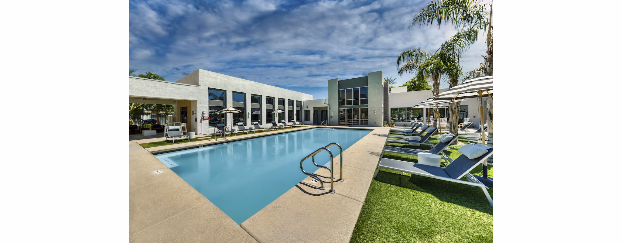 Rooftop pool with city views at Seven Apartments, a Greystar luxury community