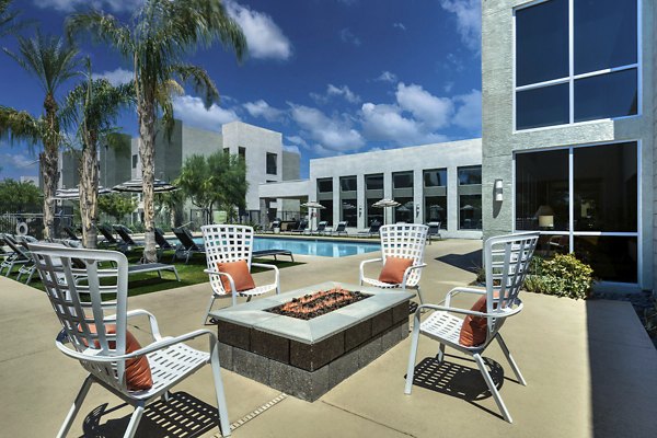 Resort-style outdoor pool area at Seven Apartments